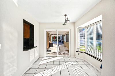 10056 Country Brook Road Boca Raton, FL 33428 - Photo 14 of 15 a view of a entryway door of the house