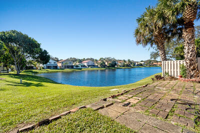 10056 Country Brook Road Boca Raton, FL 33428 - Photo 4 of 15 a view of a lake with houses in the back