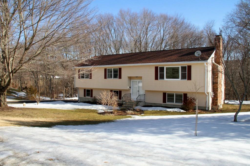 14 Middlefield Road Oxford, CT 06478 - Photo 1 of 1 a view of a house with swimming pool and sitting area