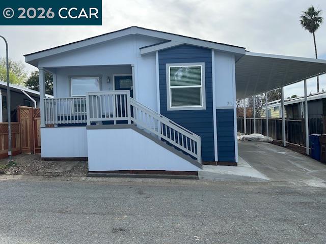 3777 Willow Pass Road, Unit 71 Bay Point, CA 94565 - Photo 1 of 1 a view of a house with porch and porch