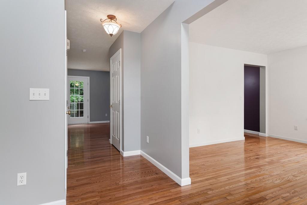 2389 Jenkinson Drive Pittsburgh, PA 15237 - Photo 15 of 29 a view of a hallway with wooden floor
