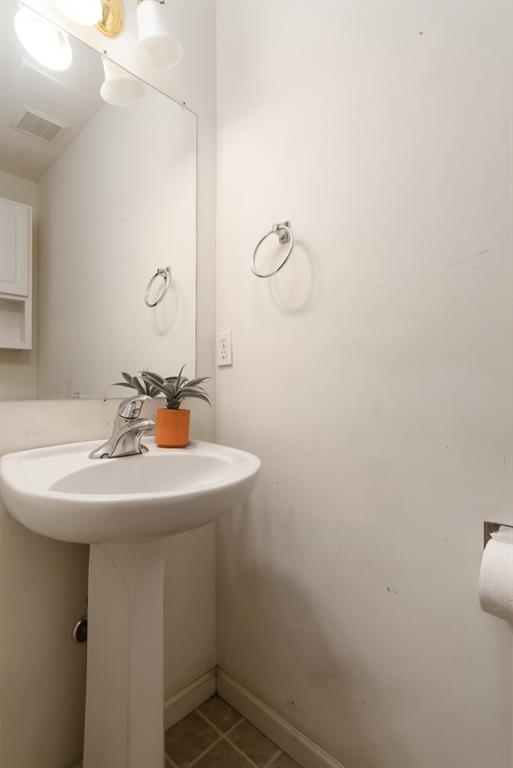 2389 Jenkinson Drive Pittsburgh, PA 15237 - Photo 17 of 29 a bathroom with a sink and a mirror