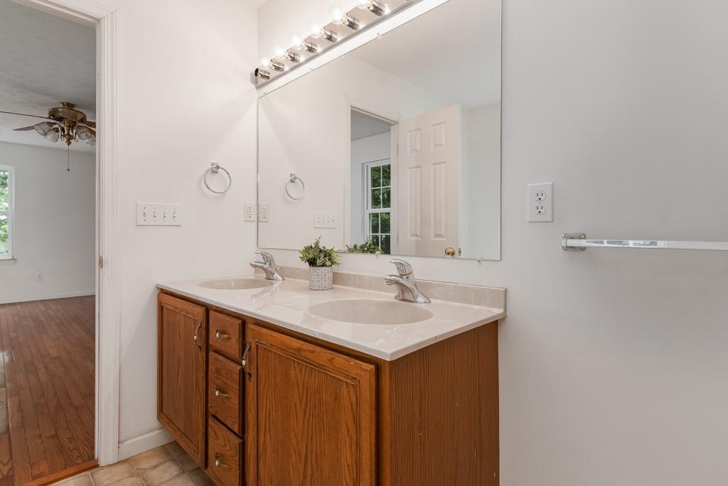 2389 Jenkinson Drive Pittsburgh, PA 15237 - Photo 19 of 29 a bathroom with a sink and a mirror