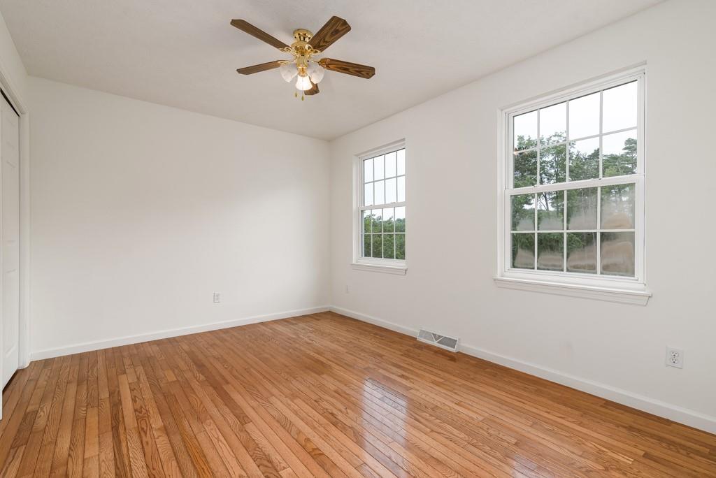 2389 Jenkinson Drive Pittsburgh, PA 15237 - Photo 22 of 29 an empty room with wooden floor and windows