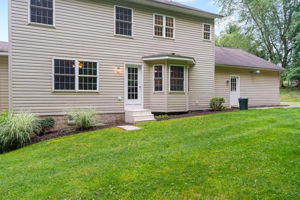 2389 Jenkinson Drive Pittsburgh, PA 15237 - Photo 27 of 29 a front view of a house with a yard
