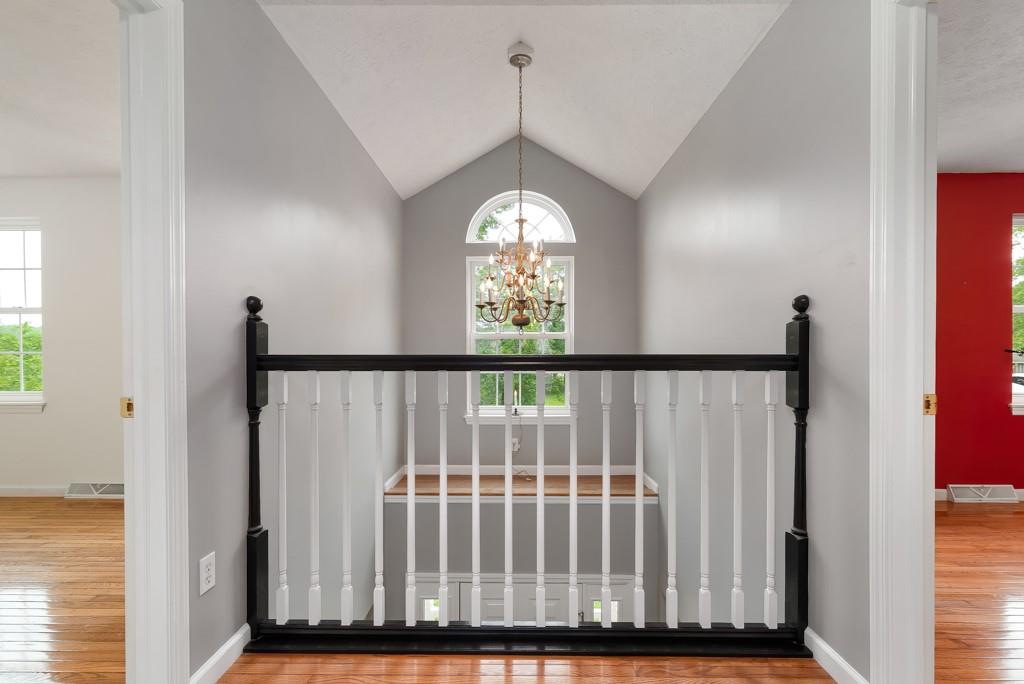 2389 Jenkinson Drive Pittsburgh, PA 15237 - Photo 4 of 29 a view of a hallway with windows and stairs
