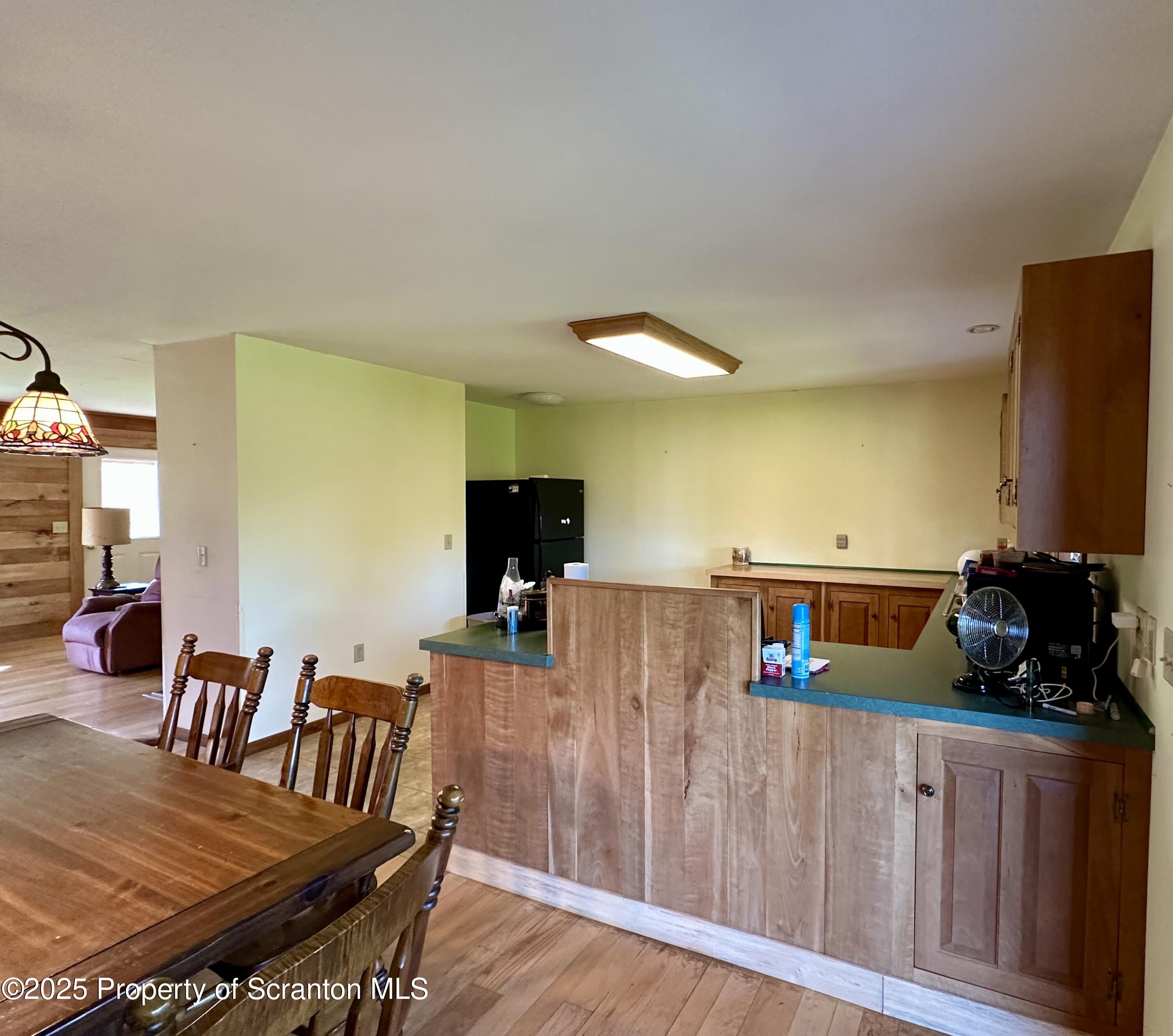 5290 Irish Hill Road Montrose, PA 18801 - Photo 18 of 67 a view of kitchen with furniture and wooden floor
