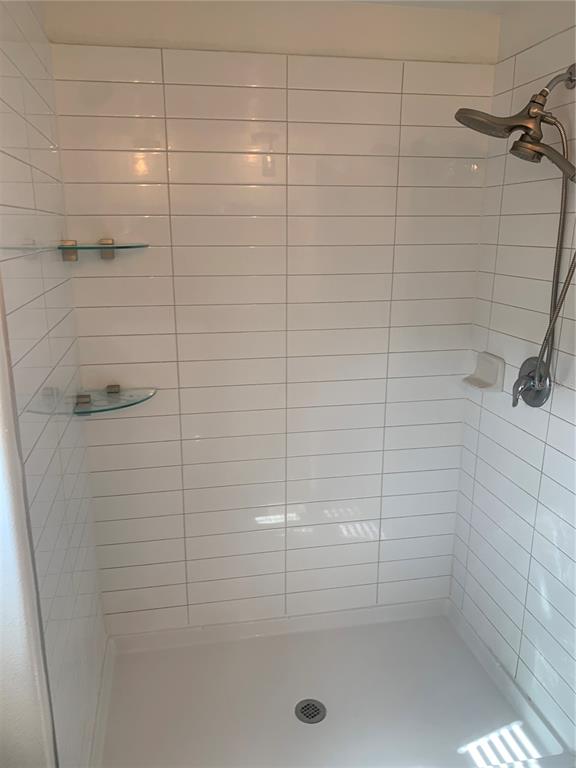 6930 Ripple Pond Loop Zephyrhills, FL 33541 - Photo 22 of 29 a bathroom with a shower