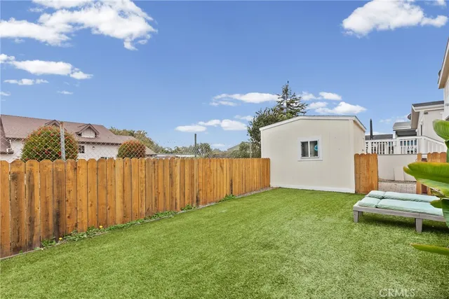 a view of a backyard with a garden