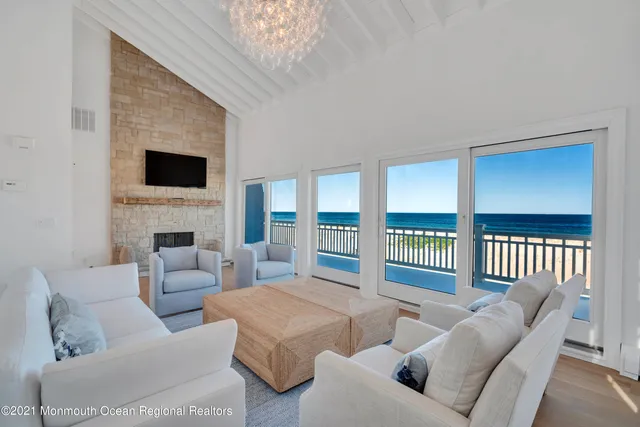 a living room with furniture and a table