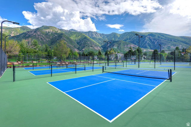 16 Gatehouse Lane Sandy, UT 84092 - Photo 72 of 73 View of tennis court featuring a mountain view and community basketball court