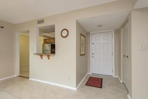 a view of a livingroom with furniture window and outside view