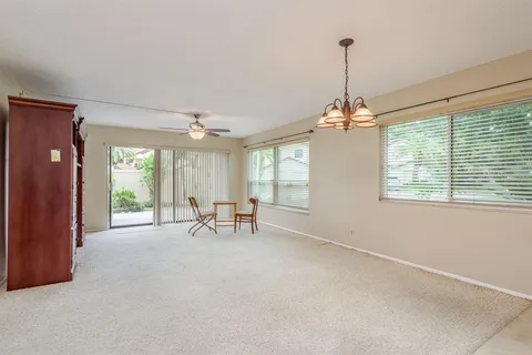 a very nice looking dining room with a window