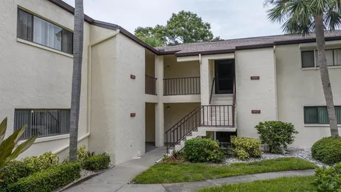an aerial view of a house having swimming pool