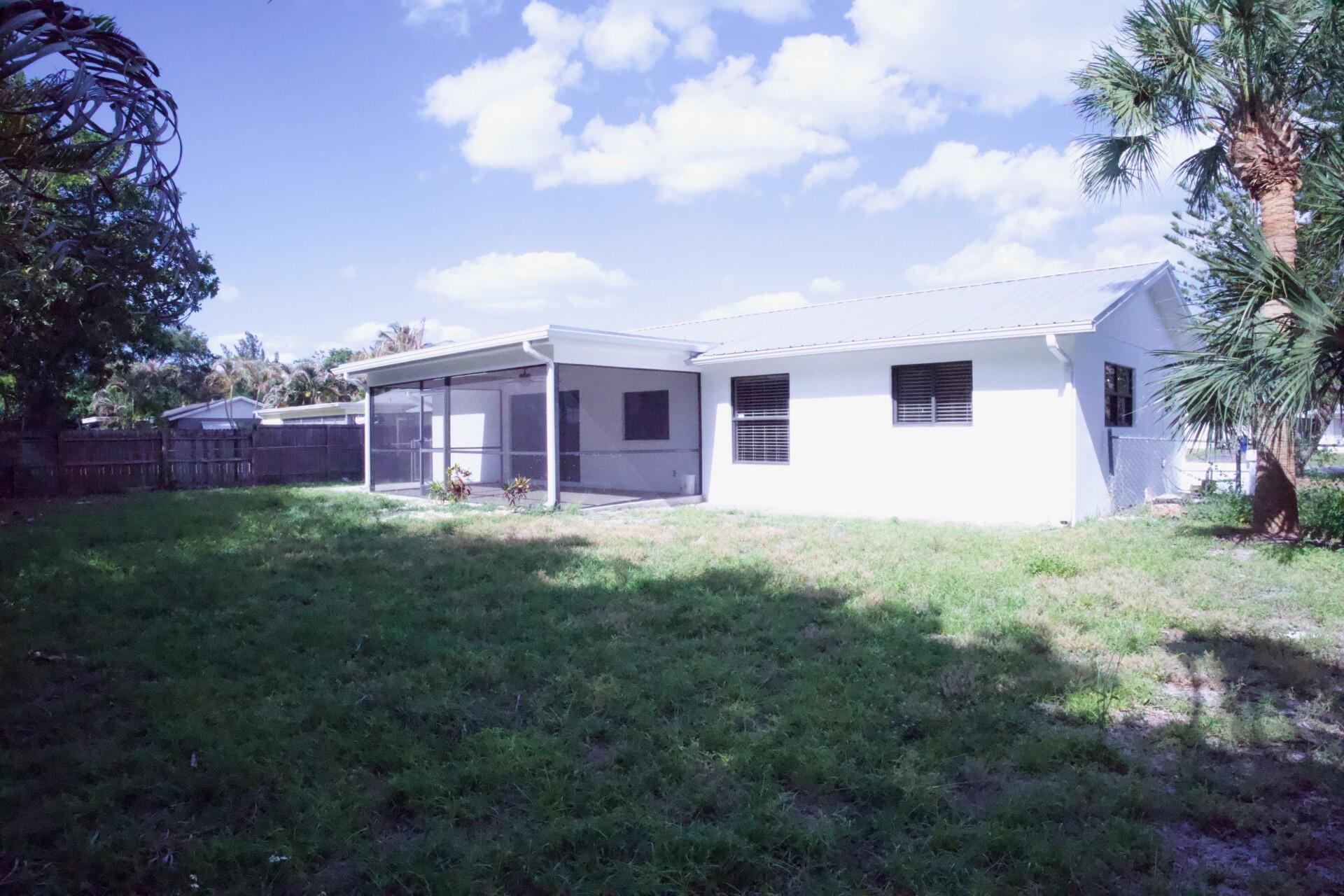 700 North Perry Avenue Jupiter, FL 33458 - Photo 16 of 33 back of house 1 p