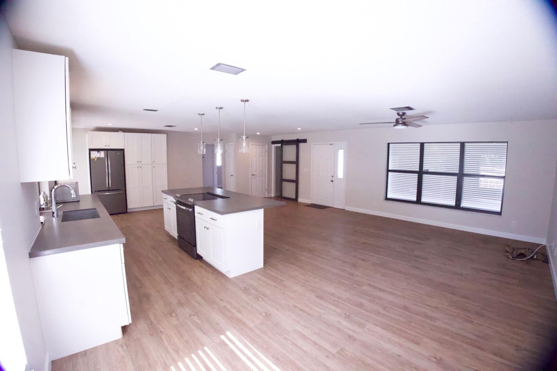 700 North Perry Avenue Jupiter, FL 33458 - Photo 3 of 33 great room 1 p