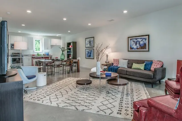 a living room with furniture and a view of living room
