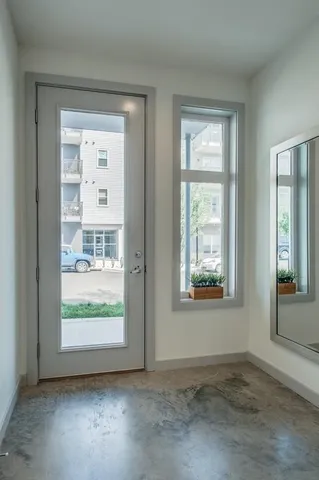 an empty room that has a window