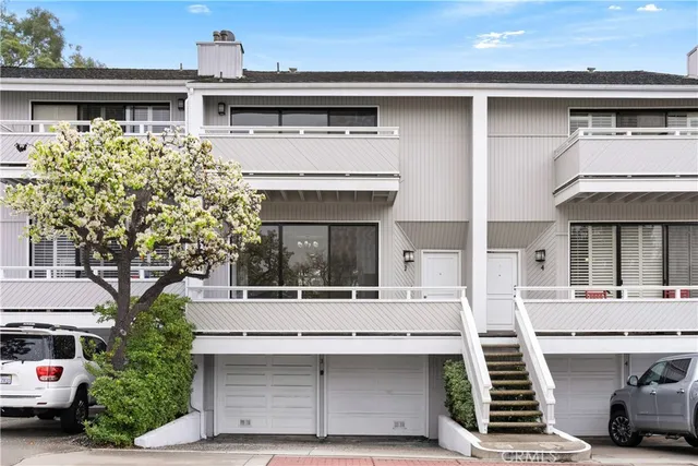 a view of a car park in front of house