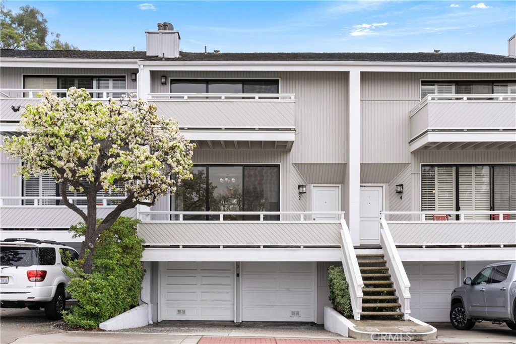 3 Kamalii Court, Unit 276 Newport Beach, CA 92663 - Photo 1 of 28 a view of a car park in front of house