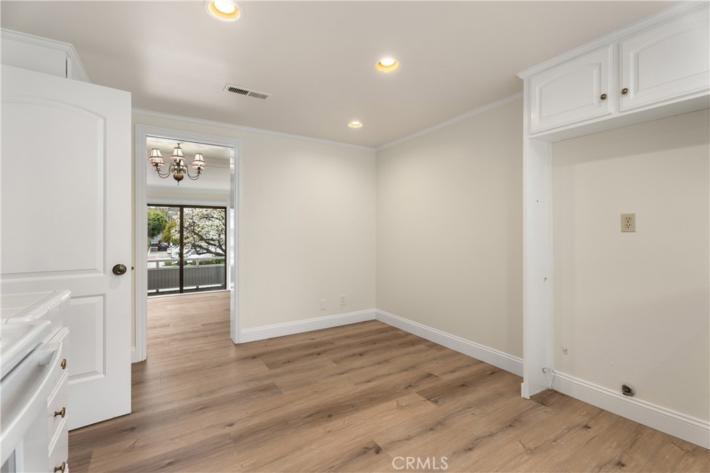 3 Kamalii Court, Unit 276 Newport Beach, CA 92663 - Photo 12 of 28 wooden floor in an empty room