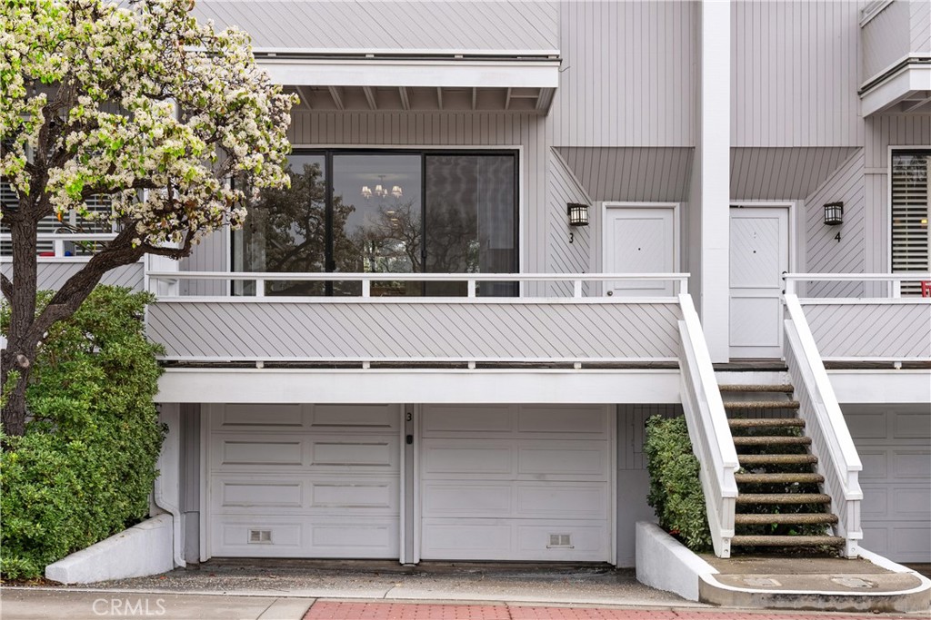 3 Kamalii Court, Unit 276 Newport Beach, CA 92663 - Photo 2 of 28 a view of a house with a garage