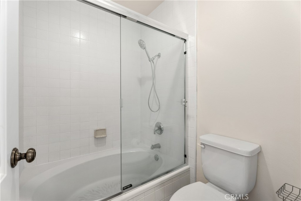 3 Kamalii Court, Unit 276 Newport Beach, CA 92663 - Photo 26 of 28 a bathroom with a shower and a toilet