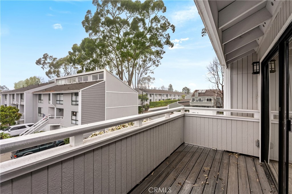 3 Kamalii Court, Unit 276 Newport Beach, CA 92663 - Photo 28 of 28 a view of a balcony with wooden floor and fence