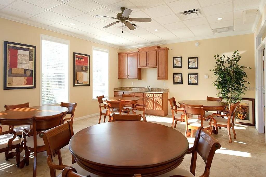7879 Southwest 80th Drive Gainesville, FL 32608 - Photo 15 of 23 a dining room with furniture and window
