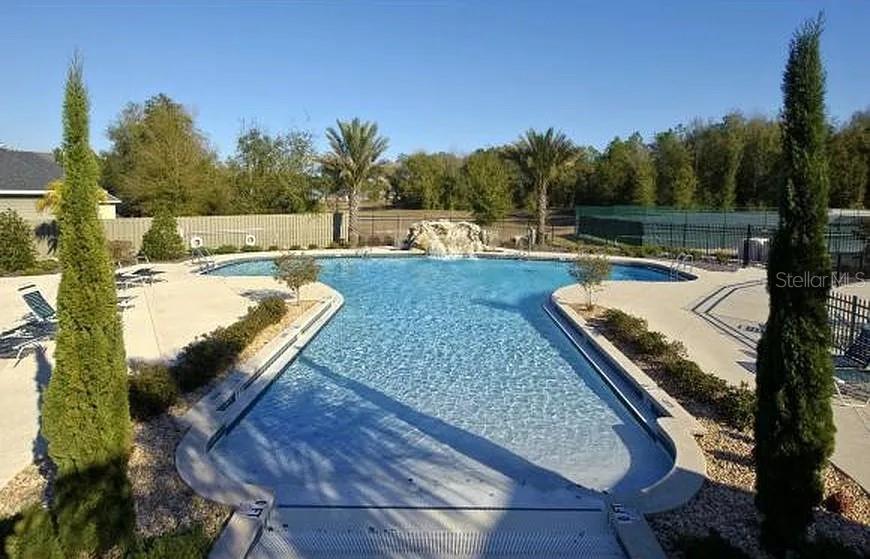 7879 Southwest 80th Drive Gainesville, FL 32608 - Photo 18 of 23 a view of a backyard with swimming pool