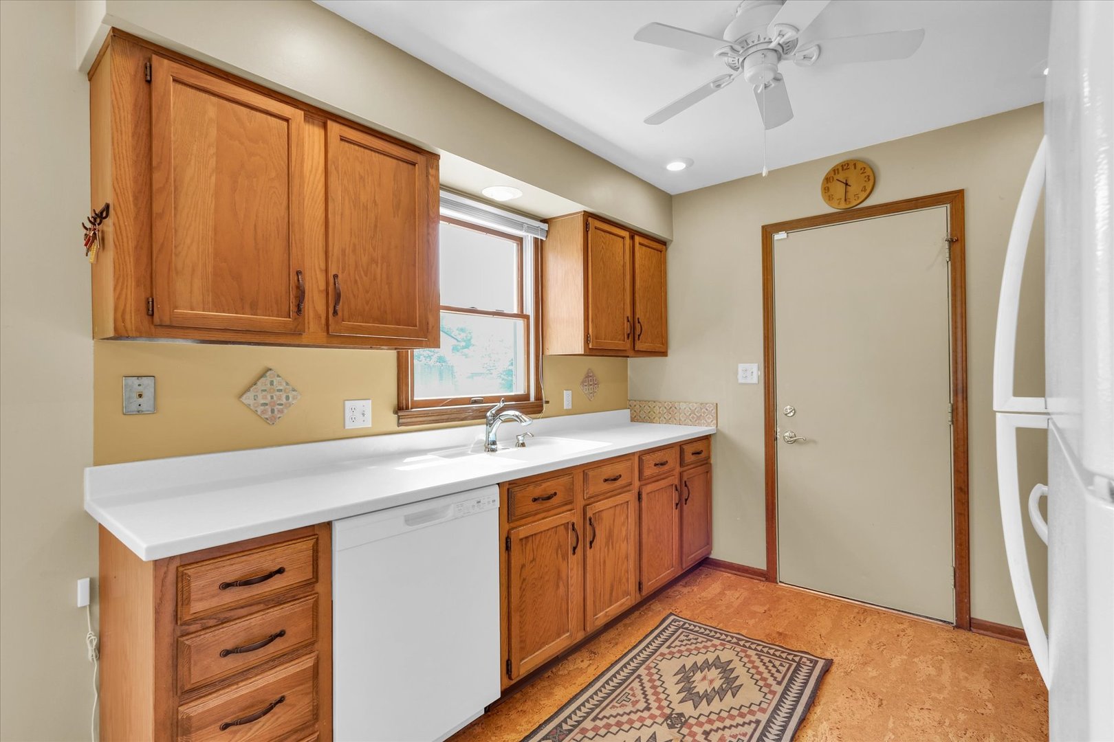 1506 Harrington Drive Champaign, IL 61821 - Photo 14 of 37 a kitchen with a sink and cabinets