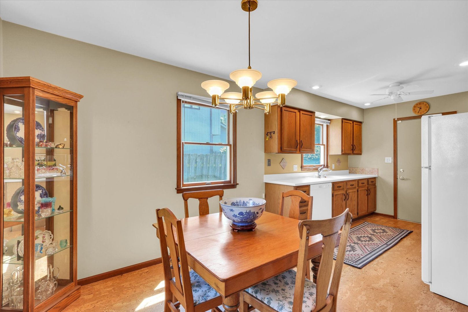 1506 Harrington Drive Champaign, IL 61821 - Photo 16 of 37 a view of a dining room with furniture window and wooden floor