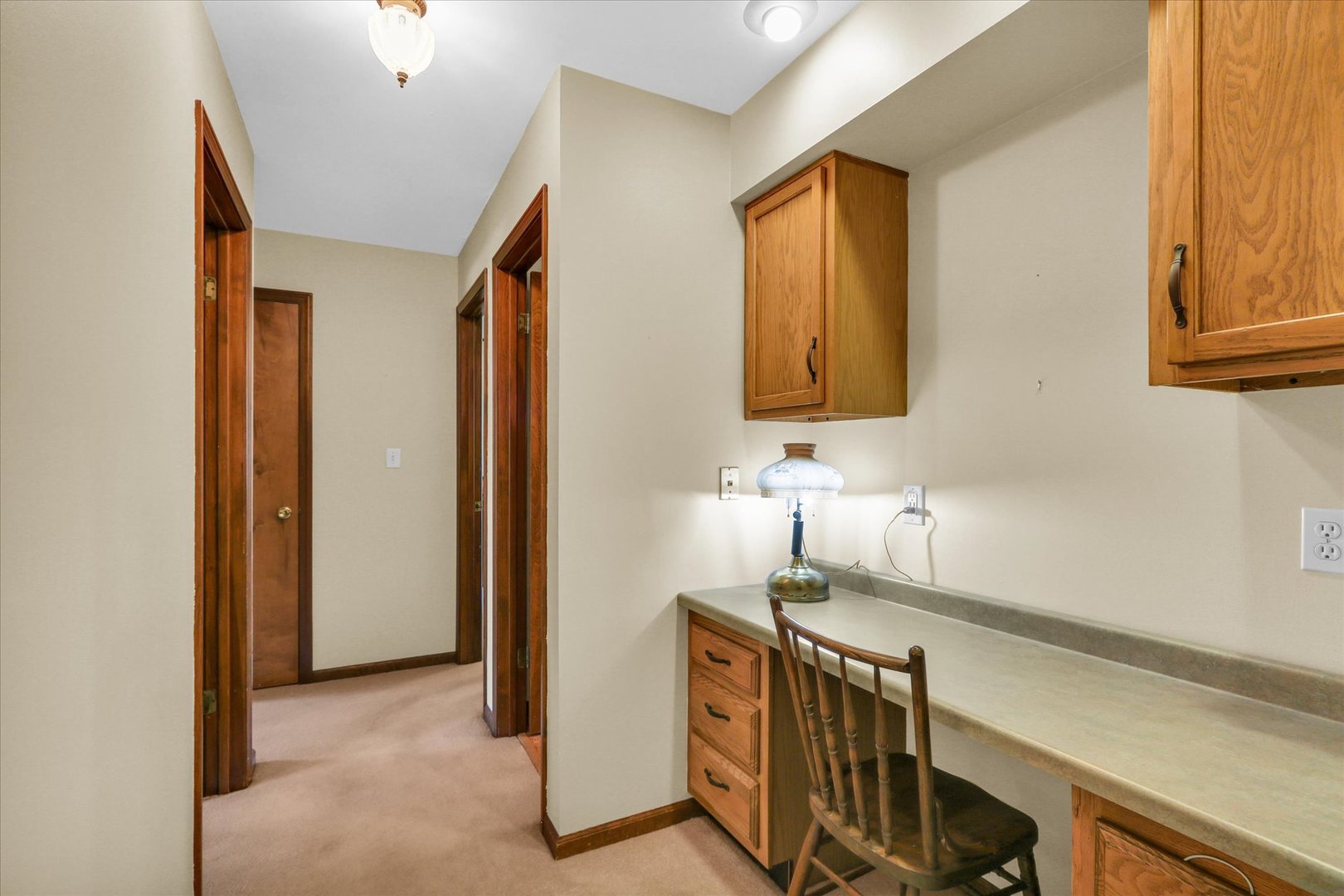 1506 Harrington Drive Champaign, IL 61821 - Photo 18 of 37 a bathroom with a sink a mirror and a shower