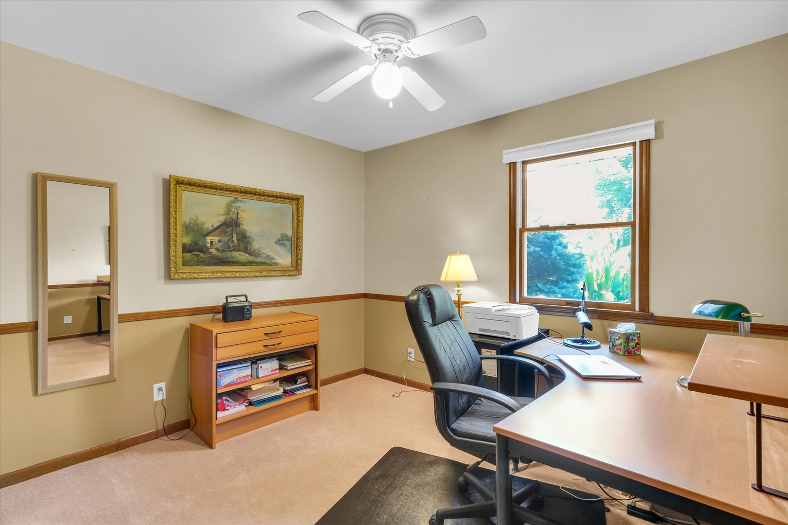1506 Harrington Drive Champaign, IL 61821 - Photo 19 of 37 a view of a workspace with furniture and a window