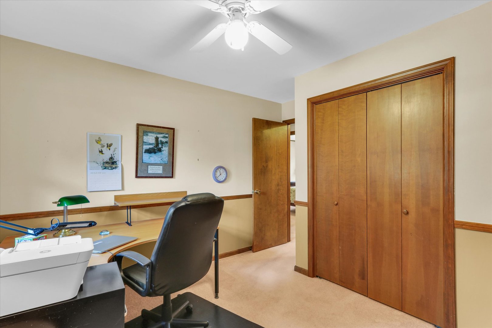 1506 Harrington Drive Champaign, IL 61821 - Photo 20 of 37 a workspace with a desk and chair and painted walls