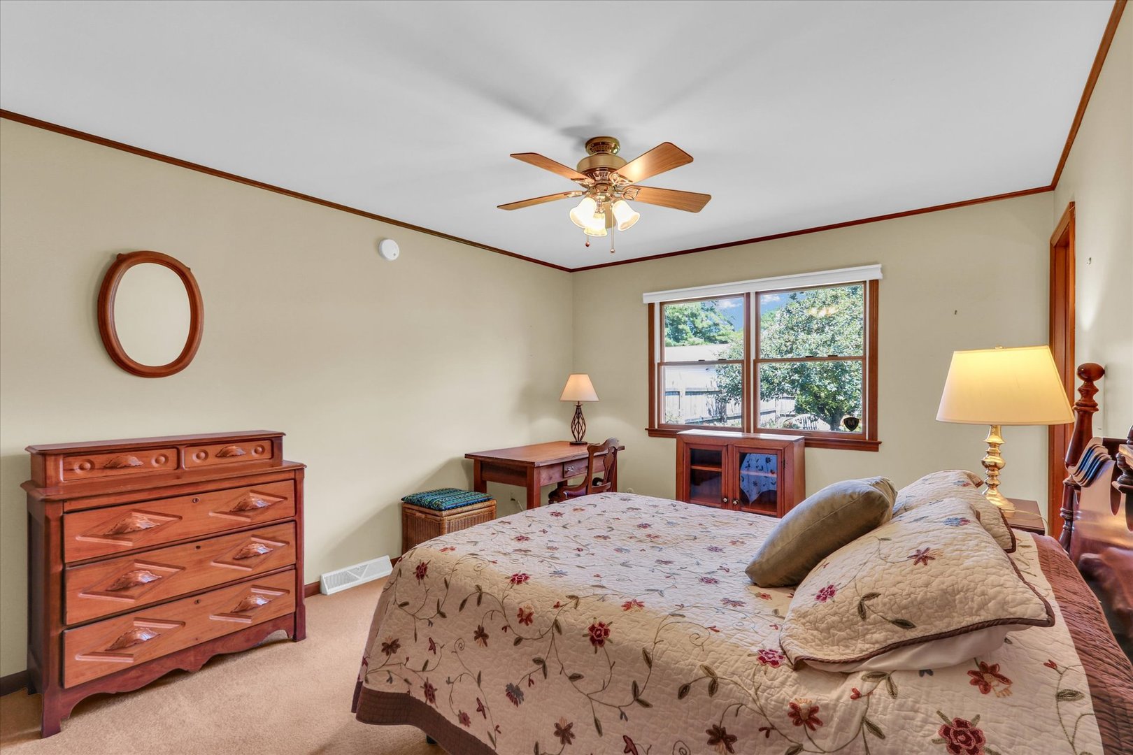1506 Harrington Drive Champaign, IL 61821 - Photo 23 of 37 a bedroom with a bed and a dresser next to a window