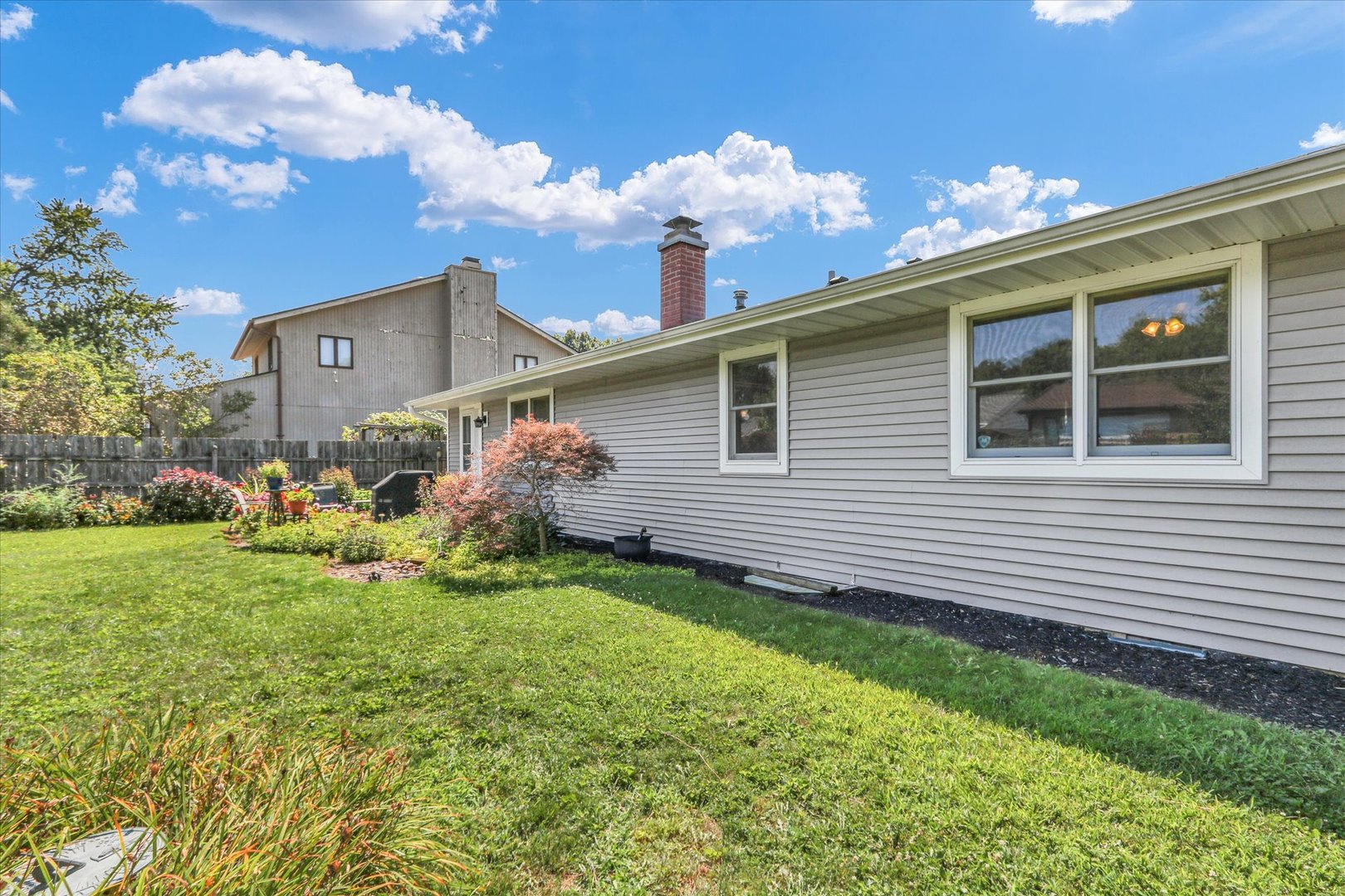 1506 Harrington Drive Champaign, IL 61821 - Photo 29 of 37 a front view of a house with garden