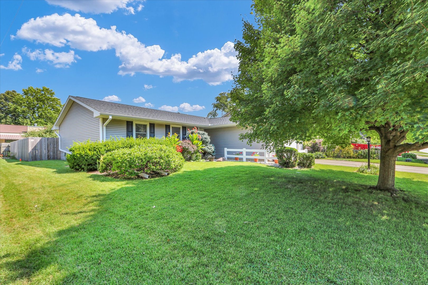 1506 Harrington Drive Champaign, IL 61821 - Photo 3 of 37 a view of backyard of house with green space