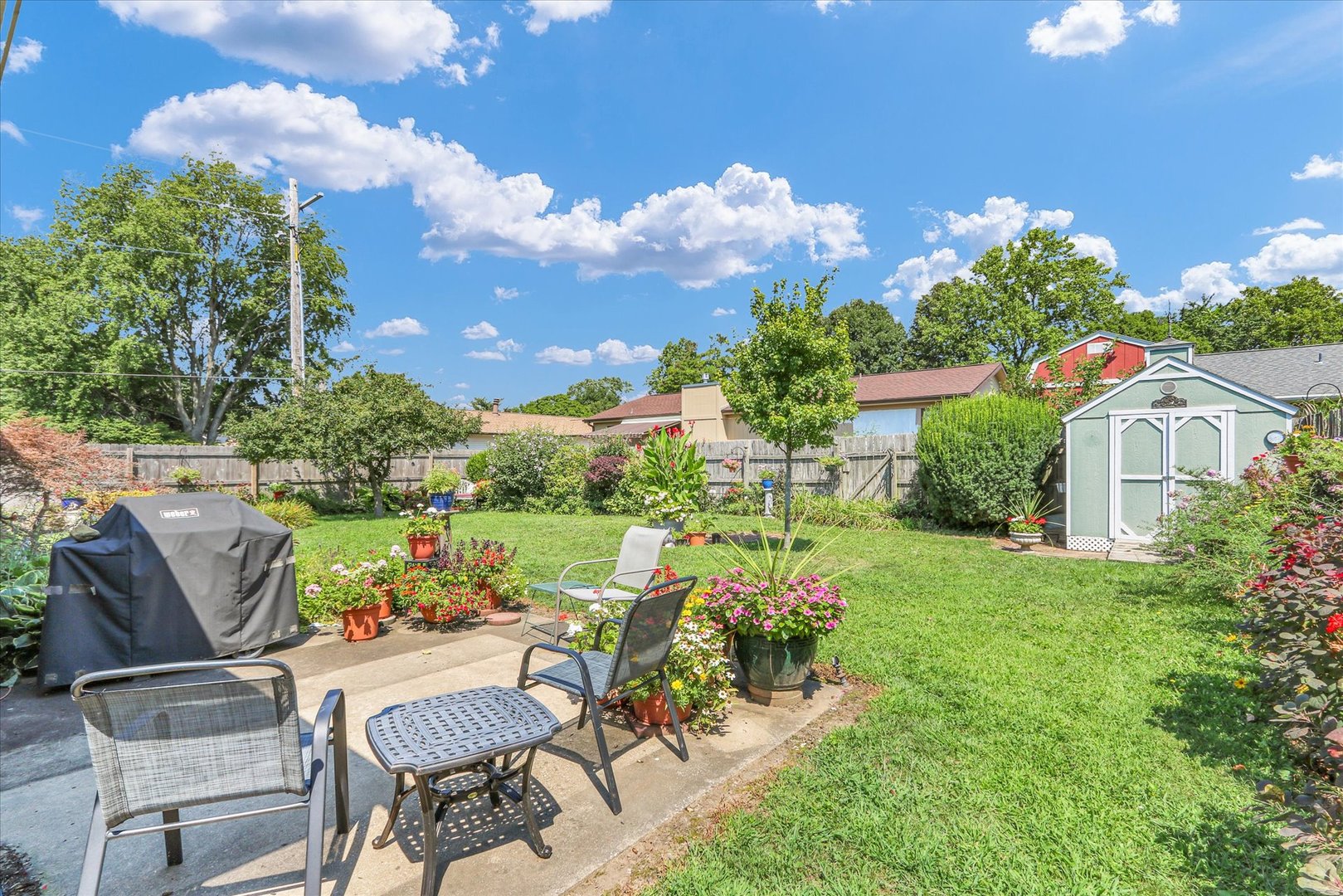 1506 Harrington Drive Champaign, IL 61821 - Photo 35 of 37 a view of a chairs and table in a patio