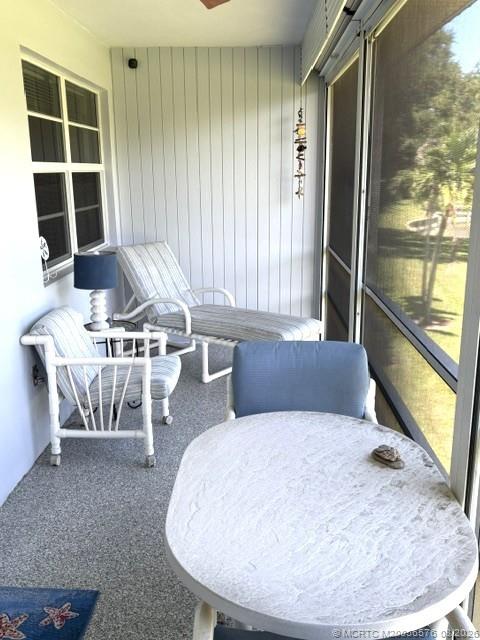 1953 Southwest Palm City Road, Unit G Stuart, FL 34994 - Photo 4 of 37 Large, fully screened lanai with plenty of room for both lounging and outdoor dining
Beautiful open golf-course/community views across a wide expanse of manicured green
Mature palm trees and tropical landscaping add that quintessential Florida feel
The elevated view gives the lanai a wonderful sense of privacy and openness
Plenty of space for multiple seating areas, making it a true outdoor living extension