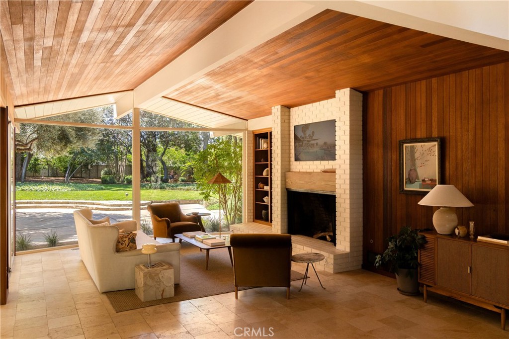 2278 Arroyo Drive Riverside, CA 92506 - Photo 17 of 75 a living room with furniture and a fireplace