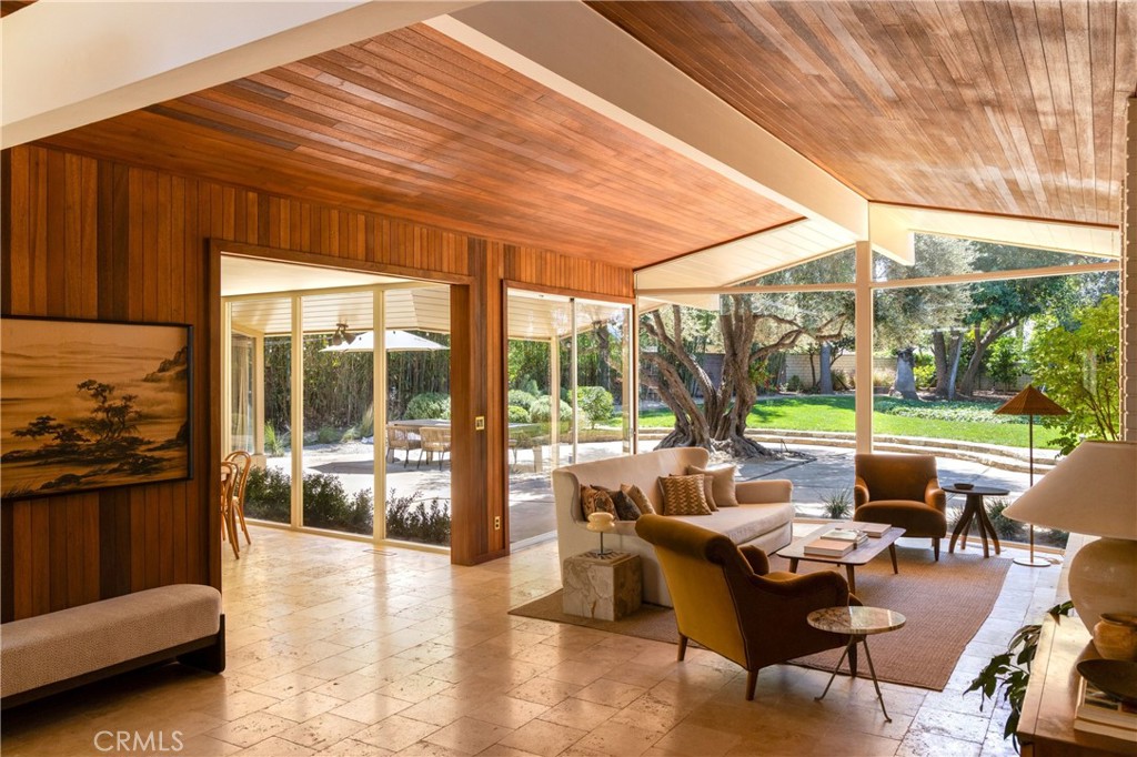 2278 Arroyo Drive Riverside, CA 92506 - Photo 19 of 75 a outdoor space with patio the couches and pool table with chairs