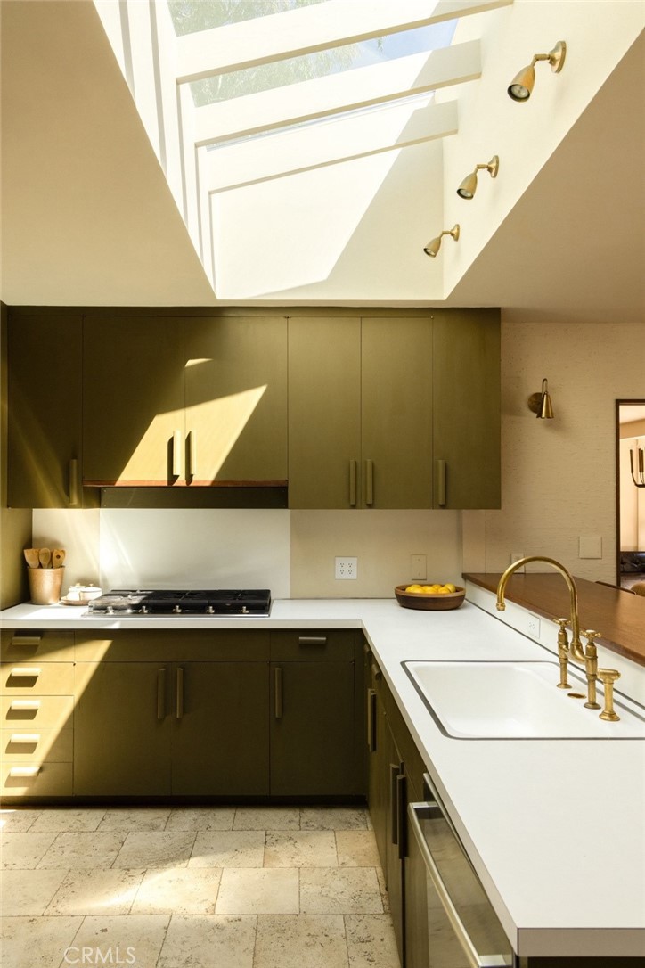 2278 Arroyo Drive Riverside, CA 92506 - Photo 26 of 75 a kitchen with a sink and a stove
