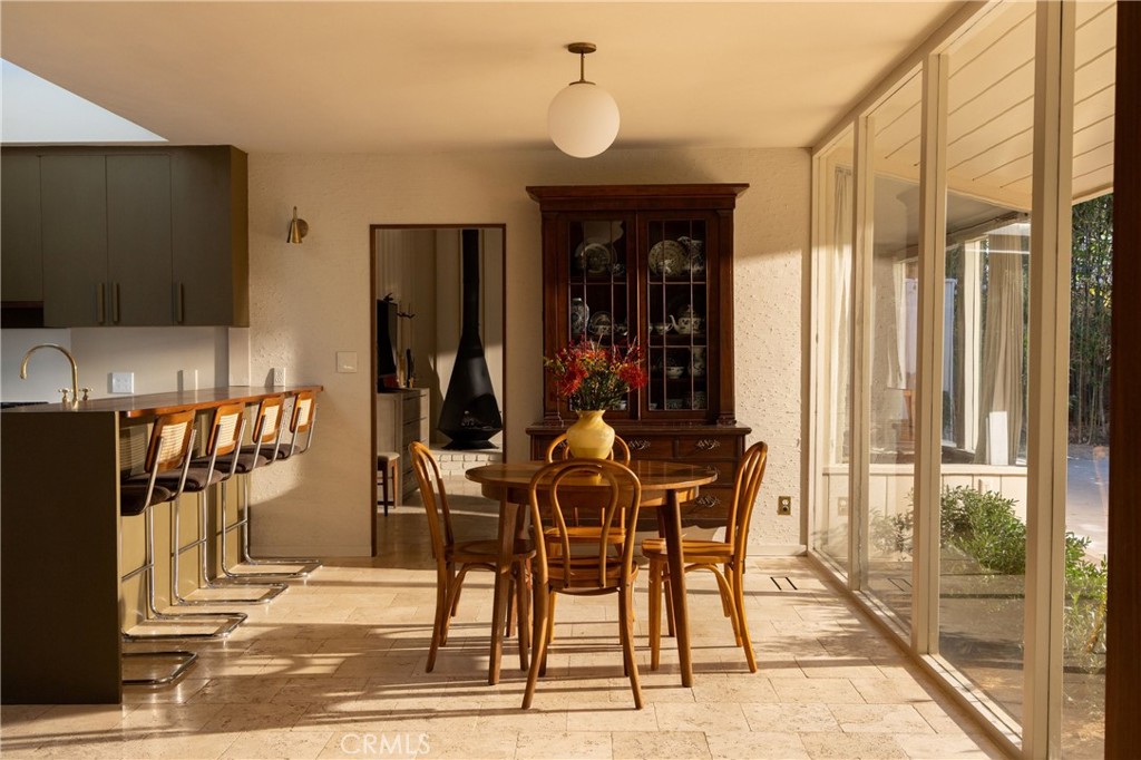 2278 Arroyo Drive Riverside, CA 92506 - Photo 33 of 75 a view of a dining room with furniture window and outside view