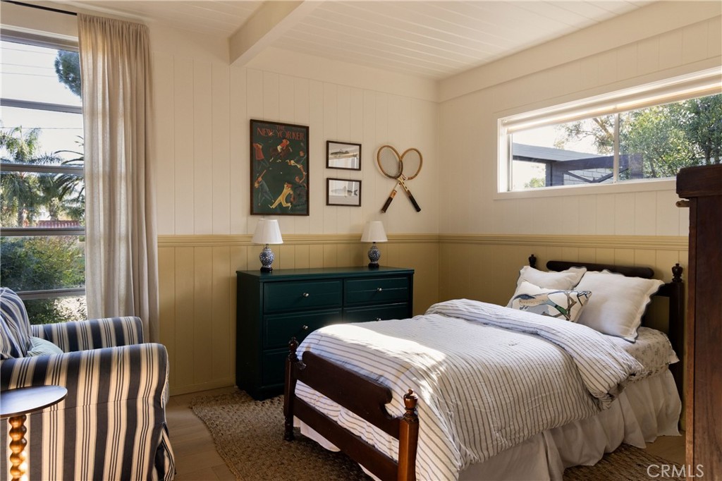 2278 Arroyo Drive Riverside, CA 92506 - Photo 41 of 75 a bedroom with a bed and wooden floor