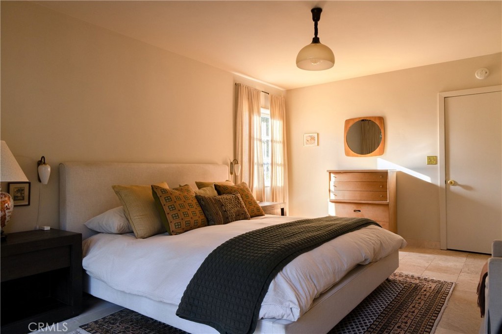 2278 Arroyo Drive Riverside, CA 92506 - Photo 45 of 75 a bedroom with a bed and wooden floor