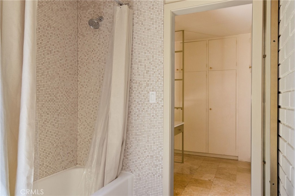 2278 Arroyo Drive Riverside, CA 92506 - Photo 52 of 75 a bathroom with a glass shower door