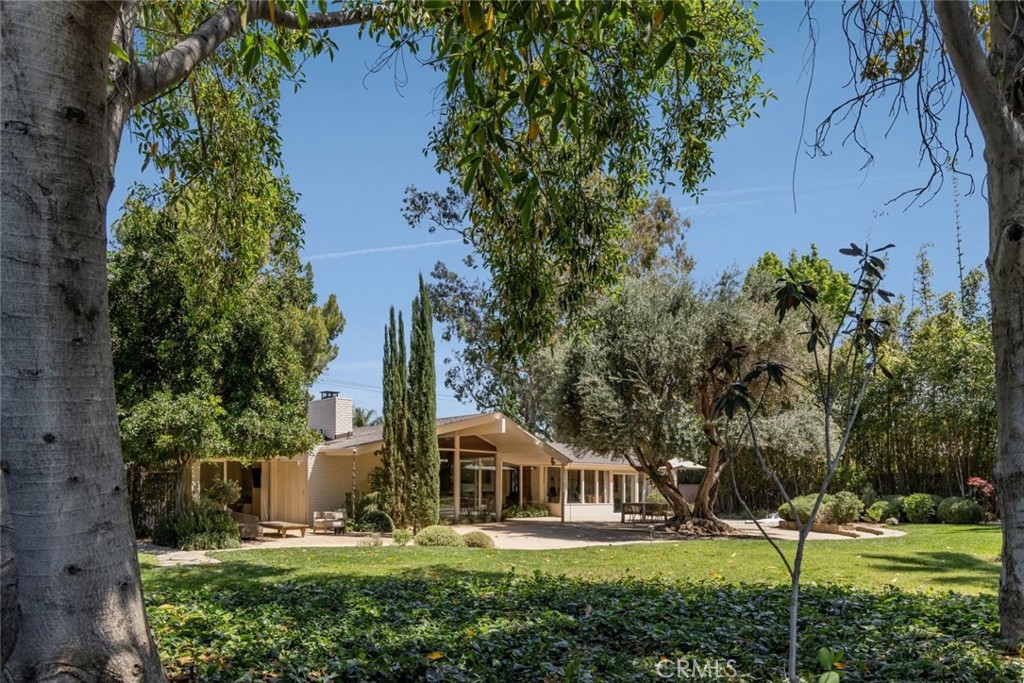 2278 Arroyo Drive Riverside, CA 92506 - Photo 60 of 75 an outdoor view of house with swimming pool and garden