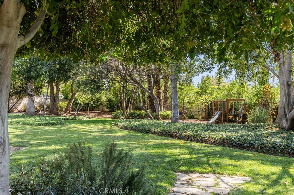 2278 Arroyo Drive Riverside, CA 92506 - Photo 66 of 75 a view of a backyard with large trees