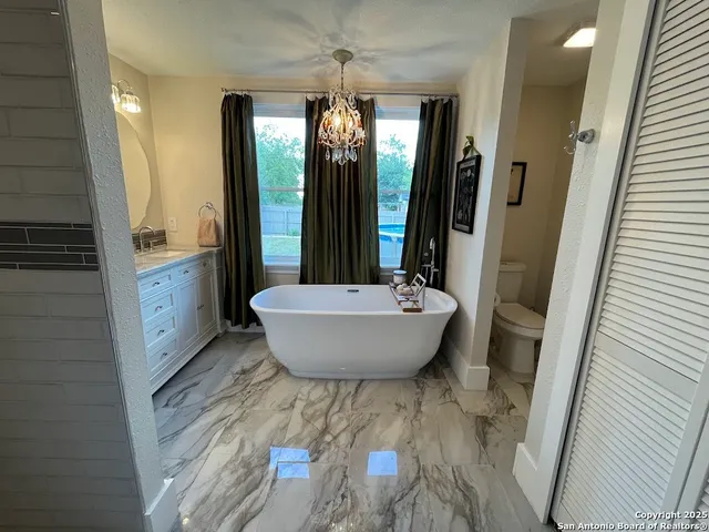 a view of a bathtub in a bathroom